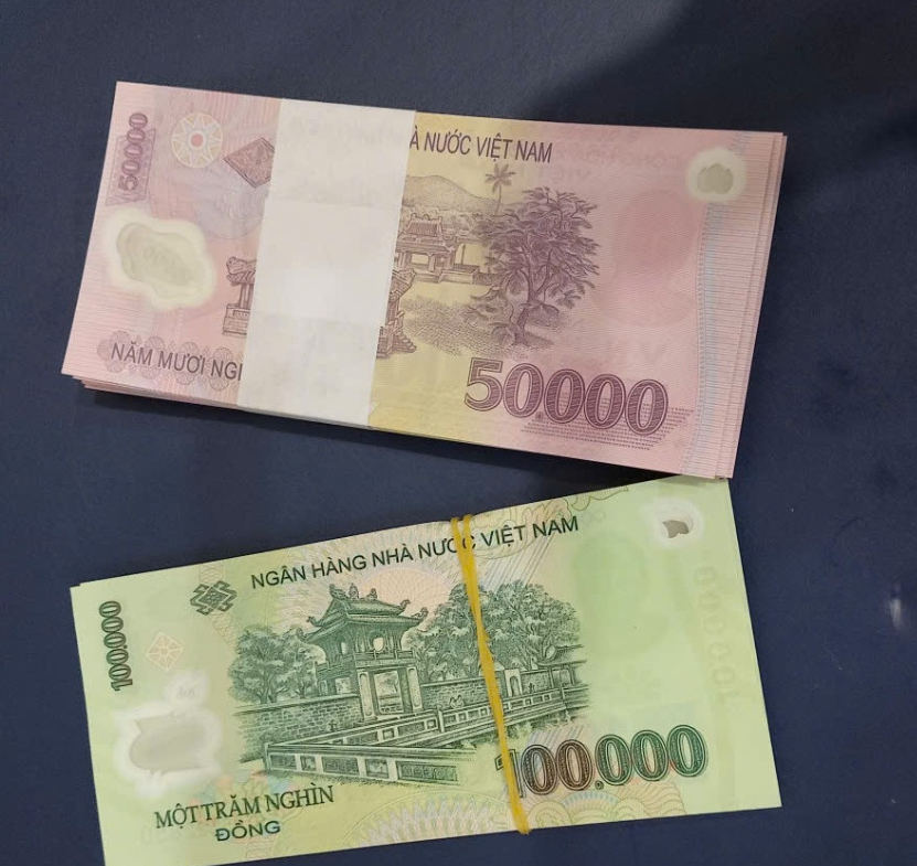 Pháp luật không cho phép cá nhân hoặc tổ chức tự phát đổi tiền mới, tiền lẻ để thu phí chênh lệch. Ảnh: N.T.