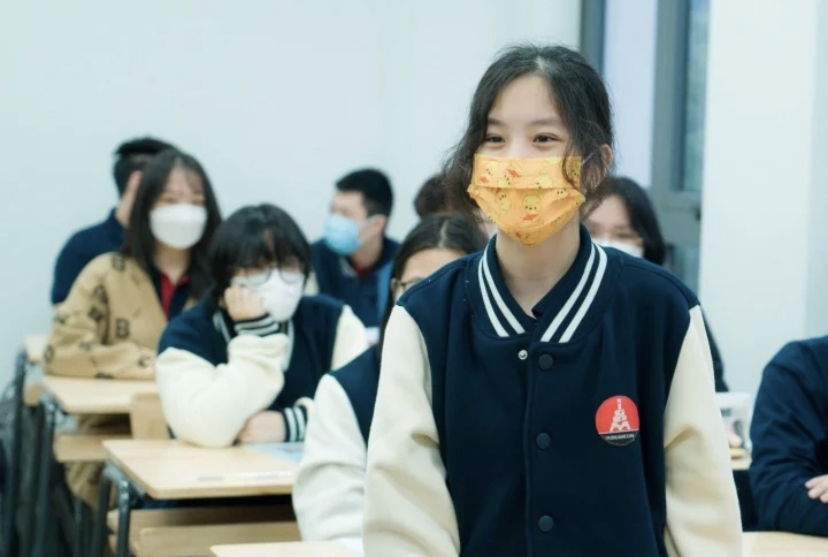 Học sinh đeo khẩu trang trong lớp học. (Ảnh minh hoạ: M.K)
