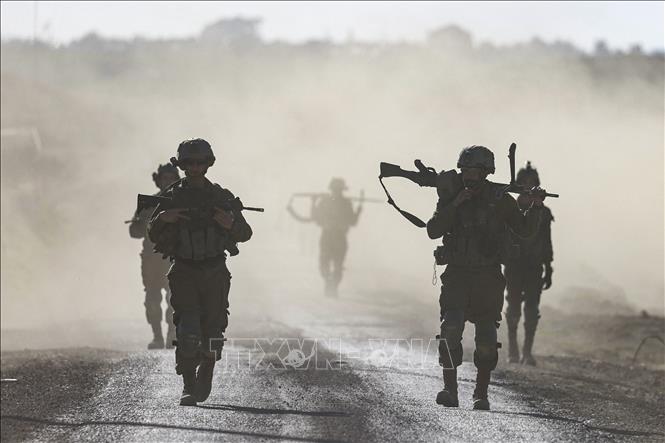 Binh sĩ Israel di chuyển gần biên giới với Dải Gaza ngày 12/3/2024. Ảnh: AFP/TTXVN