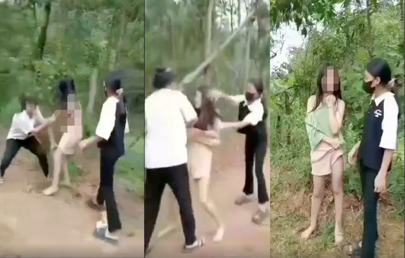 Hình ảnh cắt từ clip vụ việc nữ sinh bị đánh đập, lột đồ trong rừng keo gây bức xúc dư luận.