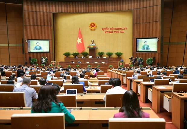 Các đại biểu Quốc hội thảo luận tại hội trường. (Ảnh: CTV/Vietnam+)