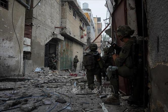 Binh sĩ Israel tiến hành chiến dịch quân sự tại Dải Gaza ngày 25/12/2023. Ảnh: THX/TTXVN