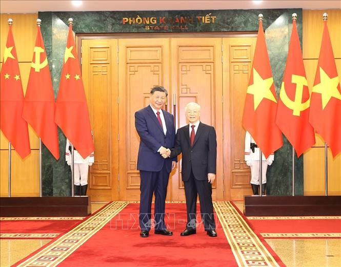 Tổng Bí thư Nguyễn Phú Trọng và Tổng Bí thư, Chủ tịch nước Trung Quốc Tập Cận Bình chụp ảnh chung. Ảnh: Trí Dũng/TTXVN