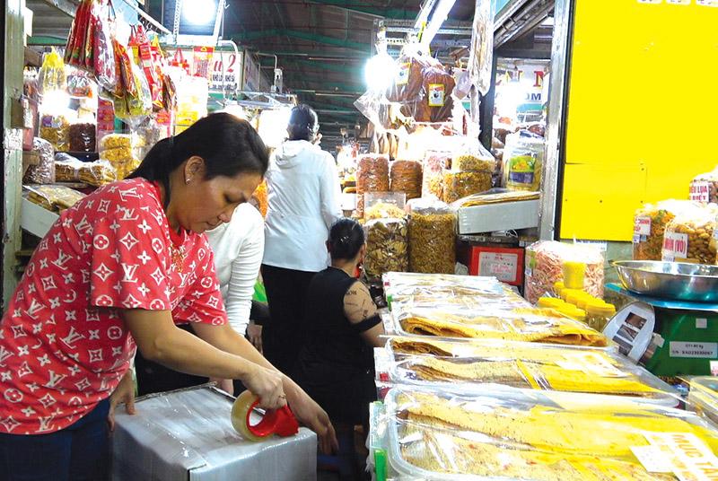 Hộ kinh doanh nhiều cửa hàng có thể khai thuế chung từ năm 2026. Ảnh: Lê Vũ