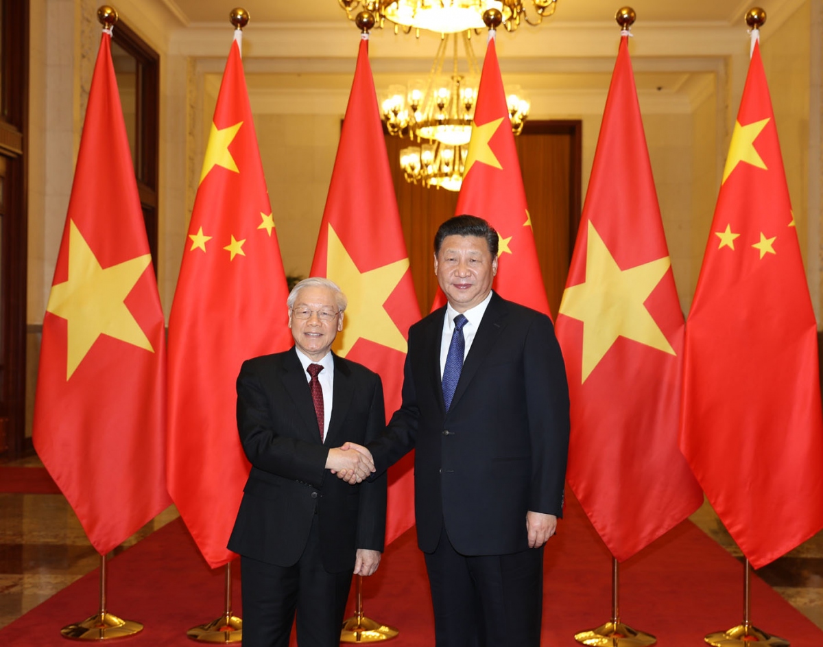 Tổng Bí thư Nguyễn Phú Trọng bắt tay Tổng Bí thư, Chủ tịch Trung Quốc Tập Cận Bình. (Ảnh: TTXVN)