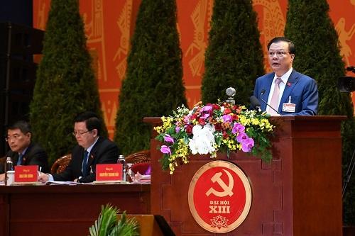 Bộ trưởng Bộ Tài chính Đinh Tiến Dũng phát biểu tham luận tại Đại hội Đảng lần thứ XIII