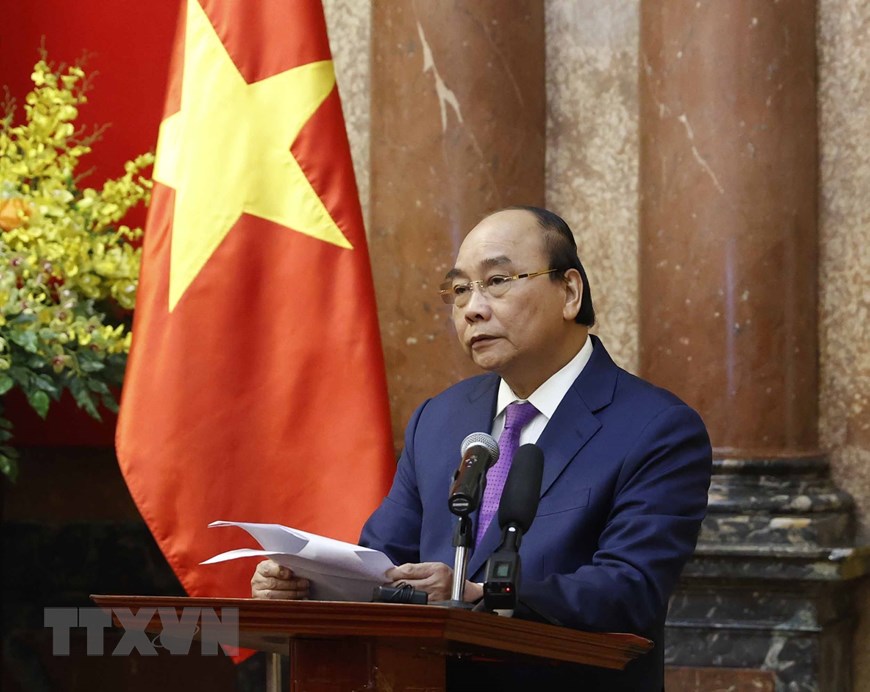 Chủ tịch nước Nguyễn Xuân Phúc phát biểu tại buổi gặp mặt. (Ảnh: TTXVN)  