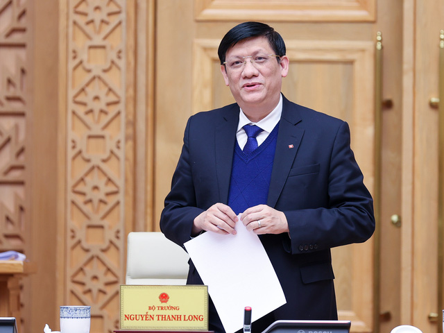 Bộ trưởng Bộ Y tế Nguyễn Thanh Long báo cáo tình hình kiểm soát dịch COVID-19 và tiêm vaccine trong dịp Tết Nguyên đán Nhâm Dần. Ảnh: VGP/Nhật Bắc