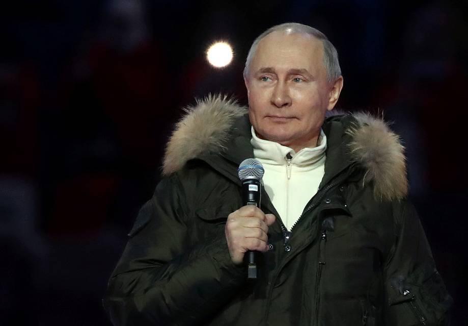 Tổng thống Putin dự lễ kỷ niệm 7 năm ngày sáp nhập Crimea ở Moskva, Nga, hôm 18/3. Ảnh: Reuters.