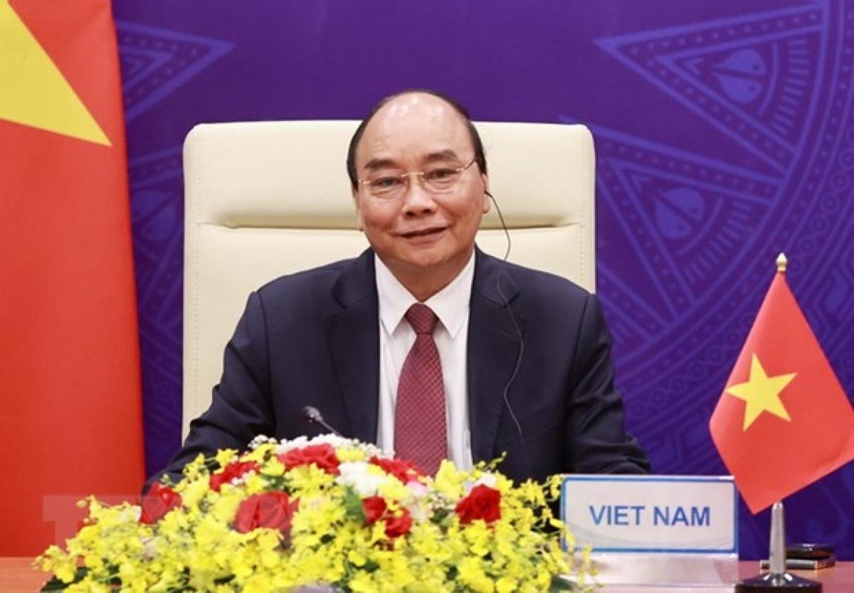 Chủ tịch nước Nguyễn Xuân Phúc tại điểm cầu Hà Nội. (Ảnh: TTXVN)