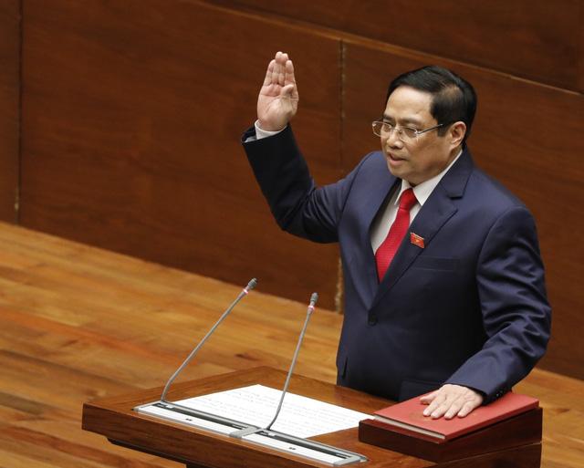 Thủ tướng Chính phủ Phạm Minh Chính tuyên thệ nhậm chức tại kỳ họp thứ 11, Quốc hội khóa XIV. 