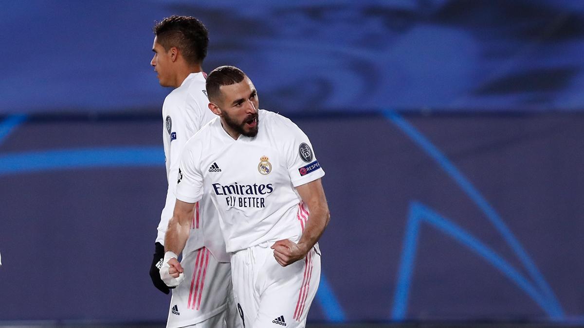 Benzema tỏa sáng giúp Real Madrid giành vé vào vòng 1/8 Champions League 2020/2021 (Ảnh: Getty).