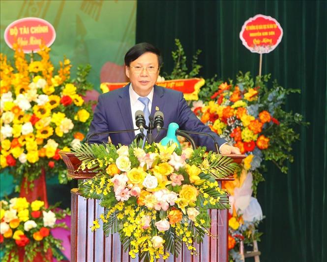 Đồng chí Hồ Quang Lợi, Phó Chủ tịch Thường trực Hội Nhà báo Việt Nam, trình bày Báo cáo Chính trị của Ban Chấp hành khoá X trình Đại hội XI.